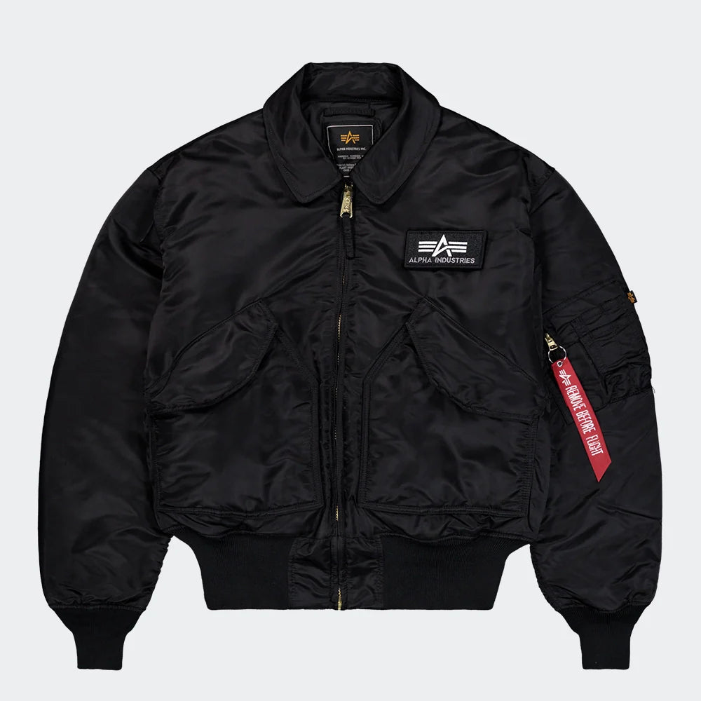 Schwarze Alpha Industries CWU 45 (HERITAGE) Bomberjacke aus robustem Nylon mit Rippstrickbündchen und Ärmeltasche.