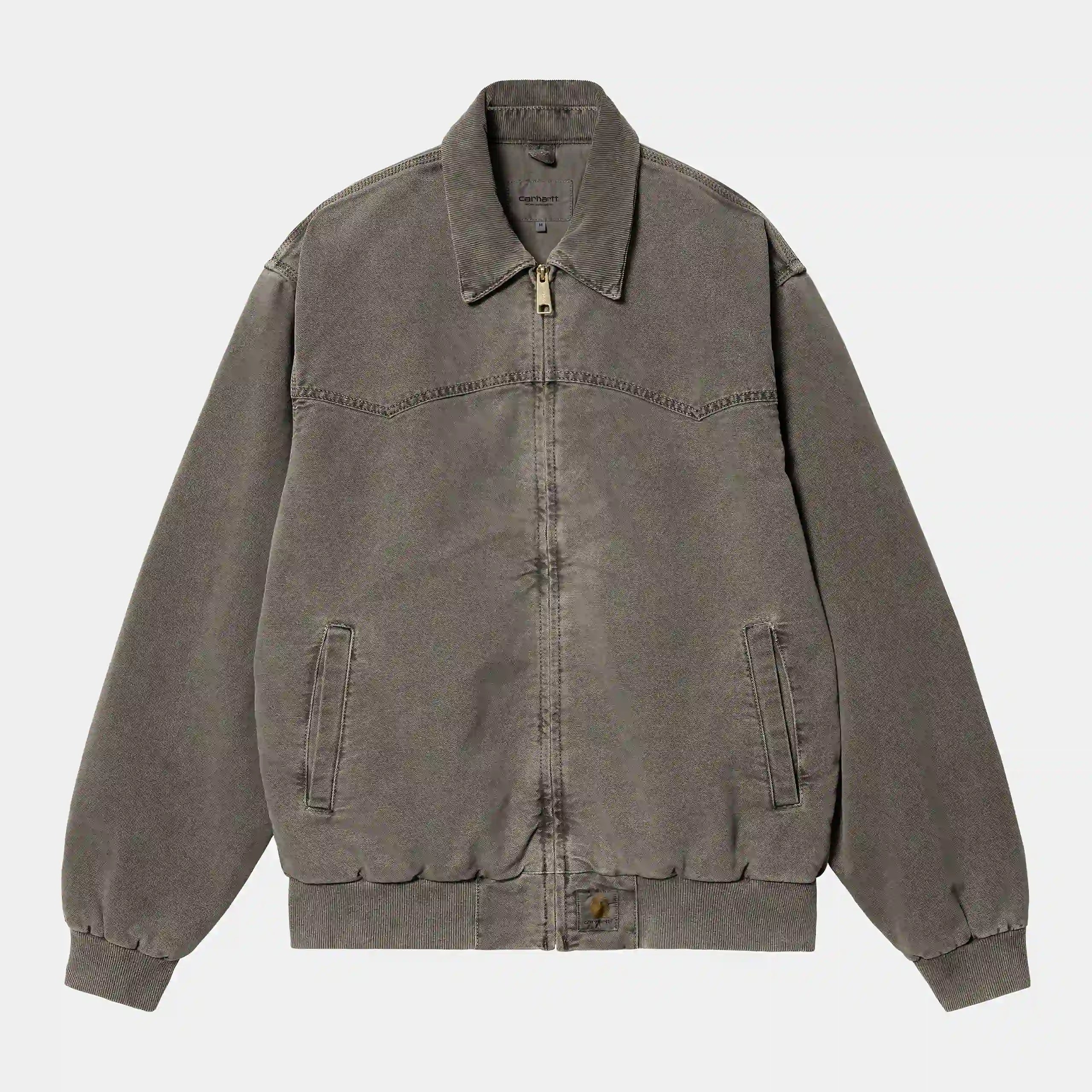 “Verblasste schwarze ("faded") Carhartt WIP OG Santa Fe Jacket. Robuste Jacke aus Baumwoll-Canvas mit Cordkragen, Steppfutter, Reißverschluss und gewebtem Square Label.“