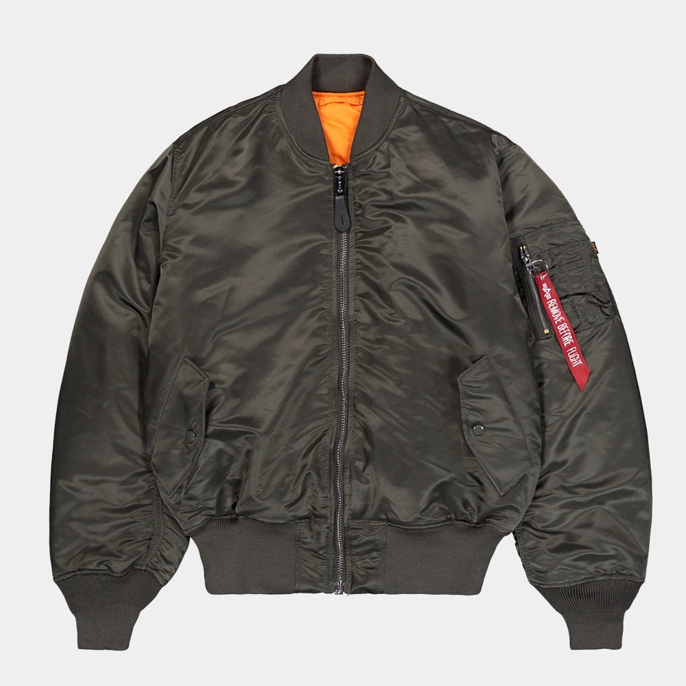“Alpha Industries MA-1 (HERITAGE) Bomberjacke in Rep. Grey, aus Flight Nylon mit orangefarbenem Innenfutter.“
