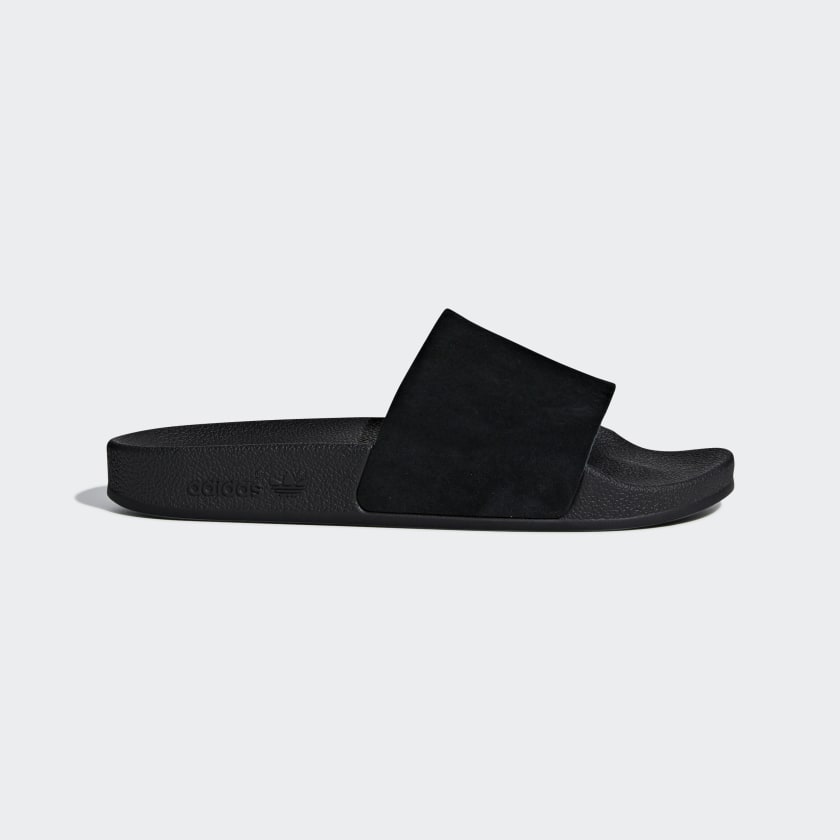 Adidas Adilette "Cartoon" W Core Black STAB Slipper Streetwear Shop Sneaker Store Adidas Schuhe stab retro sneaker air force one damen retro sneaker damen snkraddicted streetwear marken schuhe 80er jahre sneakerjagers adidas limited edition 80er schuhe retro sneaker seltene sneaker adidas sonderedition