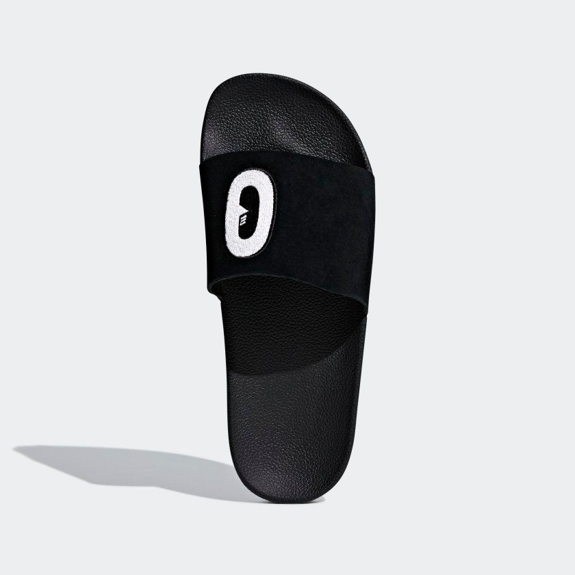 Adidas Adilette "Cartoon" W Core Black STAB Slipper Streetwear Shop Sneaker Store Adidas Schuhe stab retro sneaker air force one damen retro sneaker damen snkraddicted streetwear marken schuhe 80er jahre sneakerjagers adidas limited edition 80er schuhe retro sneaker seltene sneaker adidas sonderedition