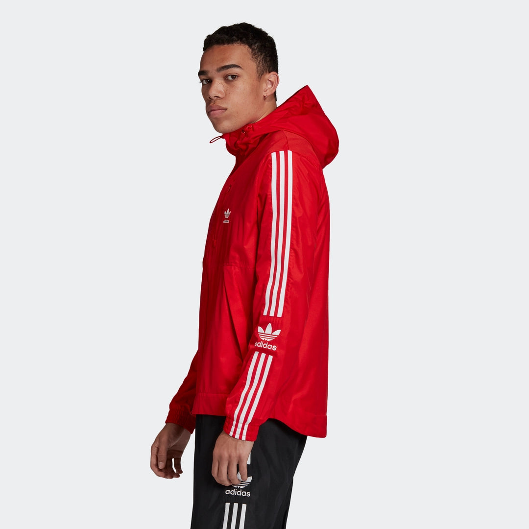 “Leuchtend rote Adidas Lock Up Windbreaker Jacke. Leichtes, wasserabweisendes Material, durchgehender Reißverschluss, hoher Kragen, seitliche Reißverschlusstaschen, kleines Adidas Trefoil Logo auf der Brust.“
