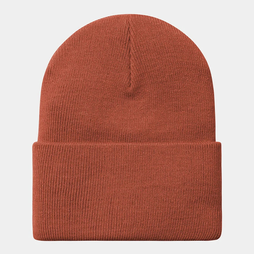 “Carhartt WIP Acrylic Watch Hat – Vermillion. Matt orangene Strickmütze aus Acryl mit umgeschlagenem Saum und Carhartt WIP Square Label bei Stickabush Berlin.“