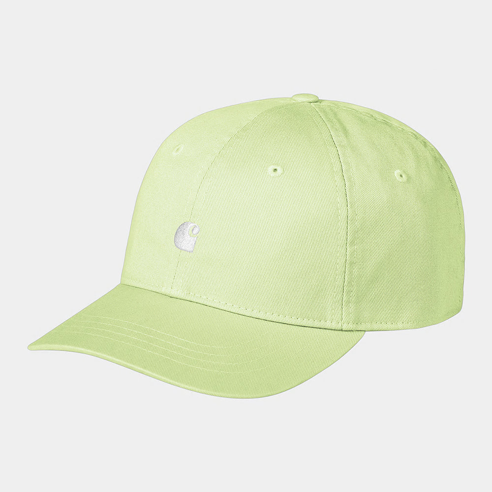 The Carhartt WIP Madison Logo Cap in Air Green/White by Carhartt Work in Progress features a curved brim and embroidered white logo on the structured crown, with ventilation eyelets and a plain light gray background.