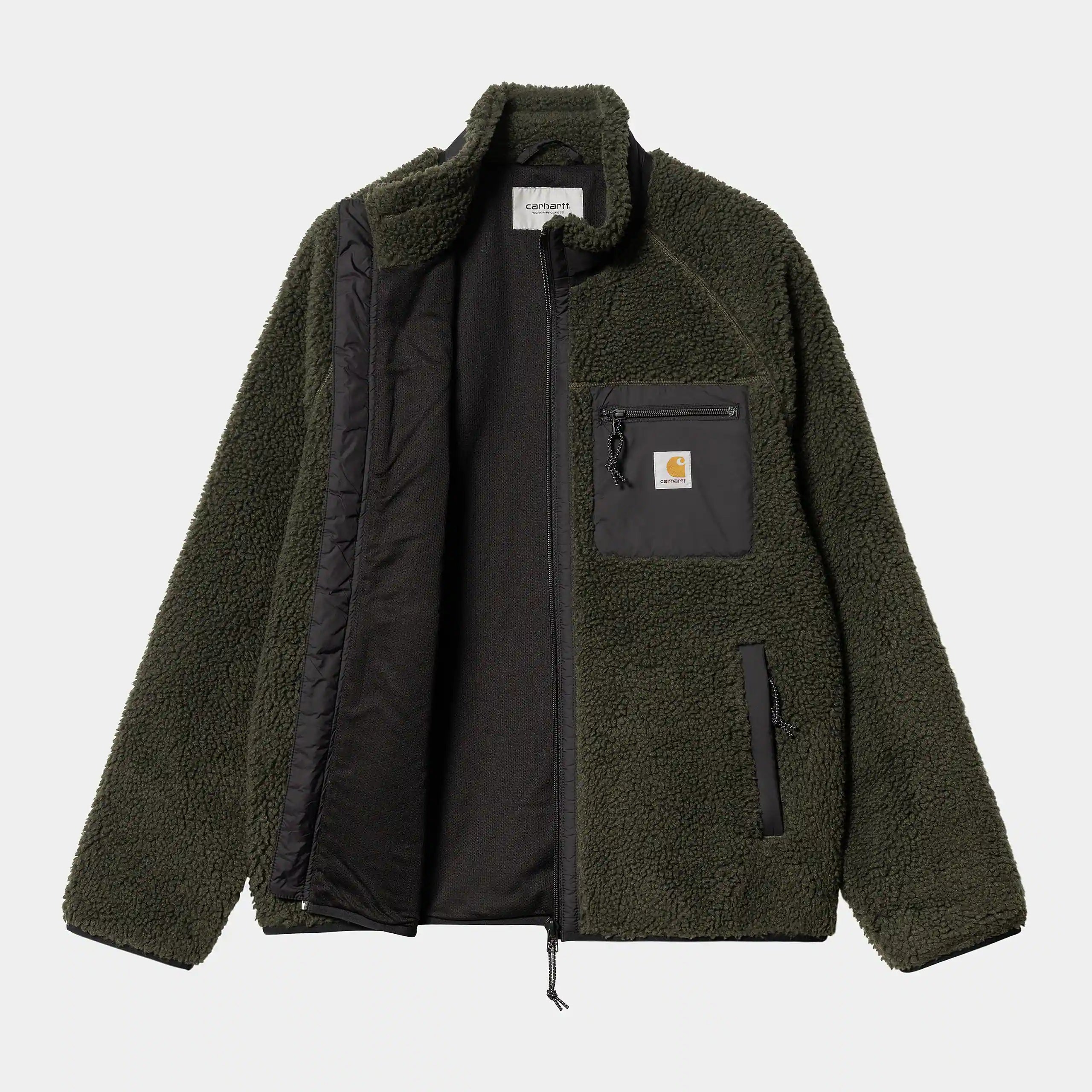“Carhartt WIP Prentis Liner – Cypress / Black. Grüner Fleece-Liner aus Polyester, mit schwarzem Netzfutter, Reißverschluss und Carhartt WIP Logo auf der Brusttasche.“