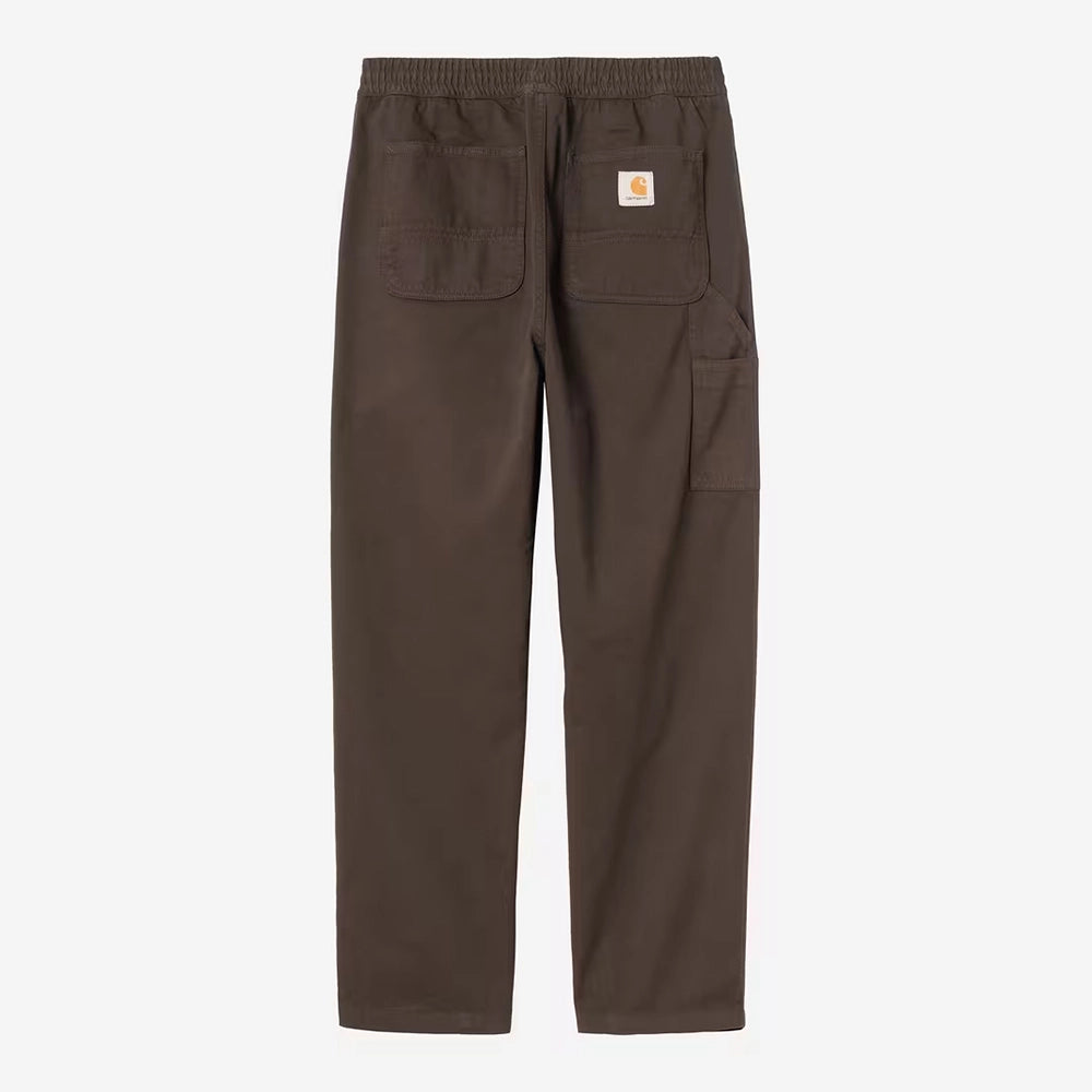 “Carhartt WIP Flint Pant aus Baumwoll-Twill in Tobacco mit elastischem Bund, Kordelzug und gewebtem Square Label jetzt bei STICKABUSH.“
