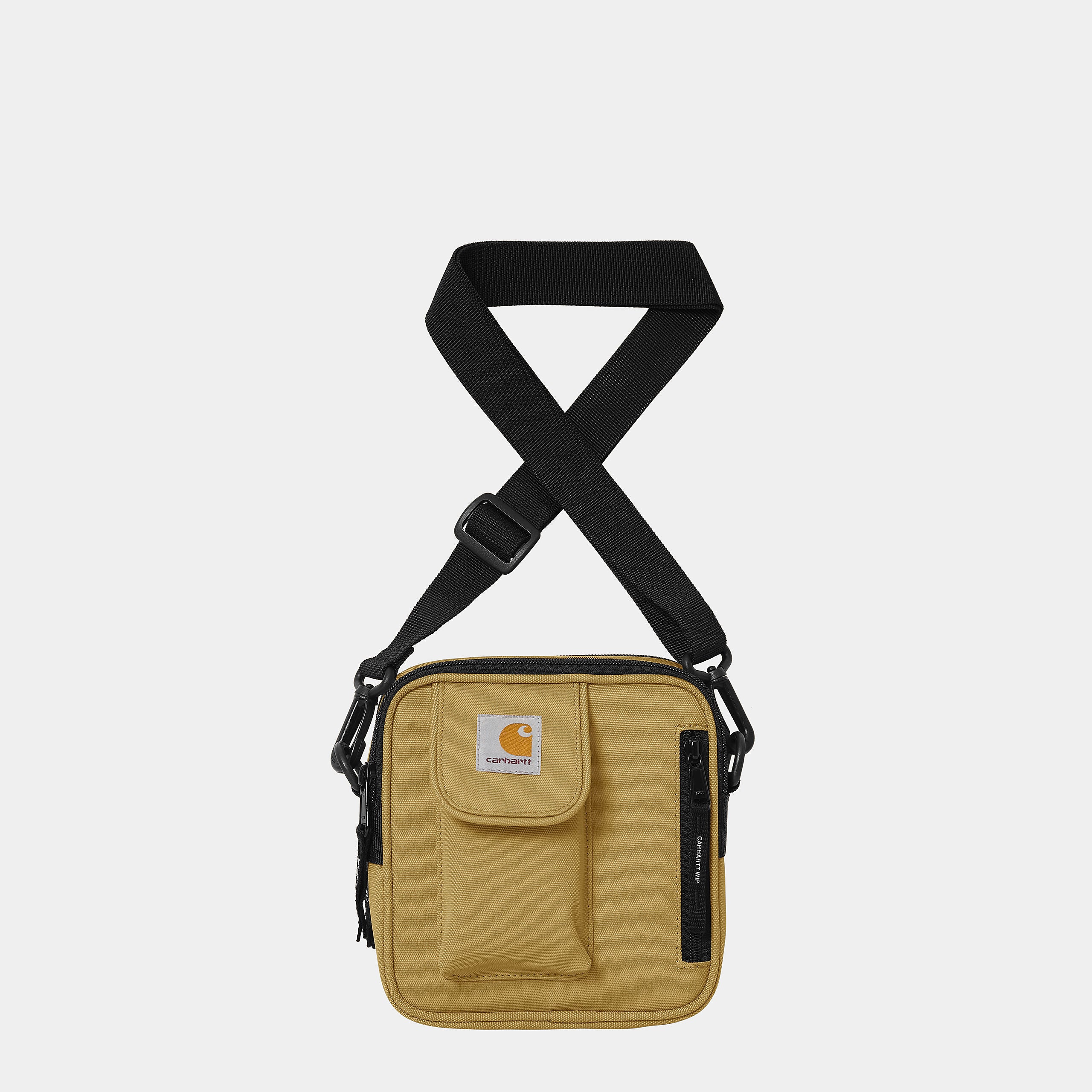 "Carhartt WIP Essentials Bag Small in Bourbon – kompakte Umhängetasche mit robustem Canvas-Material, mehreren Fächern und verstellbarem Schulterriemen. Perfekt für den Alltag und Streetwear-Looks."