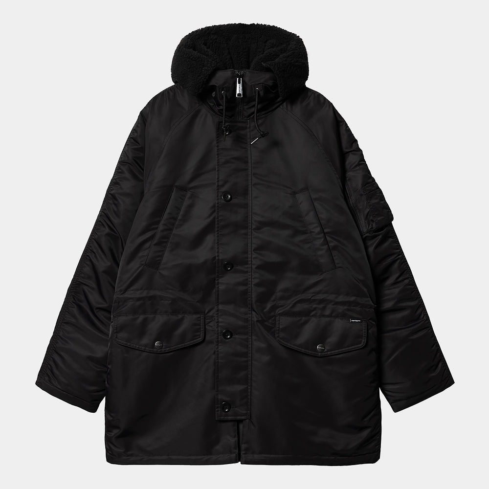 Carhartt WIP Hooded Olten Parka in Schwarz, getragen von einem Model, mit Kapuze und langen Ärmeln, aus robustem Canvas-Material.
