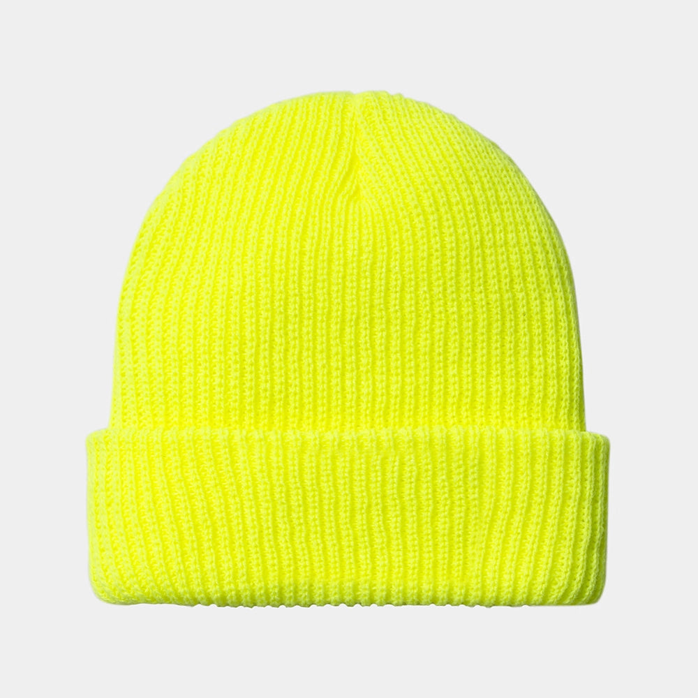 Carhartt WIP Industry Beanie – Lumo Yellow / Black. Leuchtend gelbe, gerippte Beanie-Mütze mit umgeschlagenem Saum, schwarzem Streifen und gewebtem Carhartt WIP Logo.
