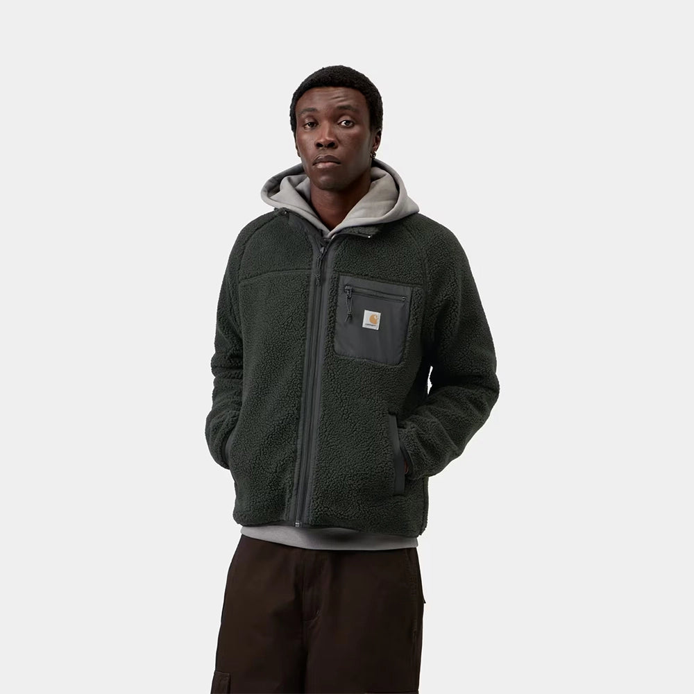 Carhartt WIP Prentis Liner in Raven / Black – Vorderansicht am Model der dunkelgrünen Fleece-Jacke mit schwarzen Nylon-Details und Quadrat-Logo.