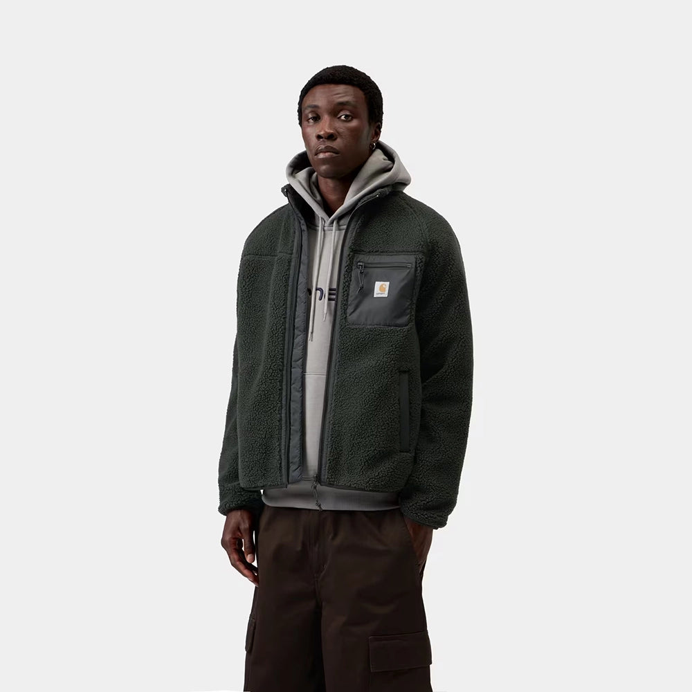 Carhartt WIP Prentis Liner in Raven / Black – Vorderansicht am Model der dunkelgrünen Fleece-Jacke mit schwarzen Nylon-Details und Quadrat-Logo.
