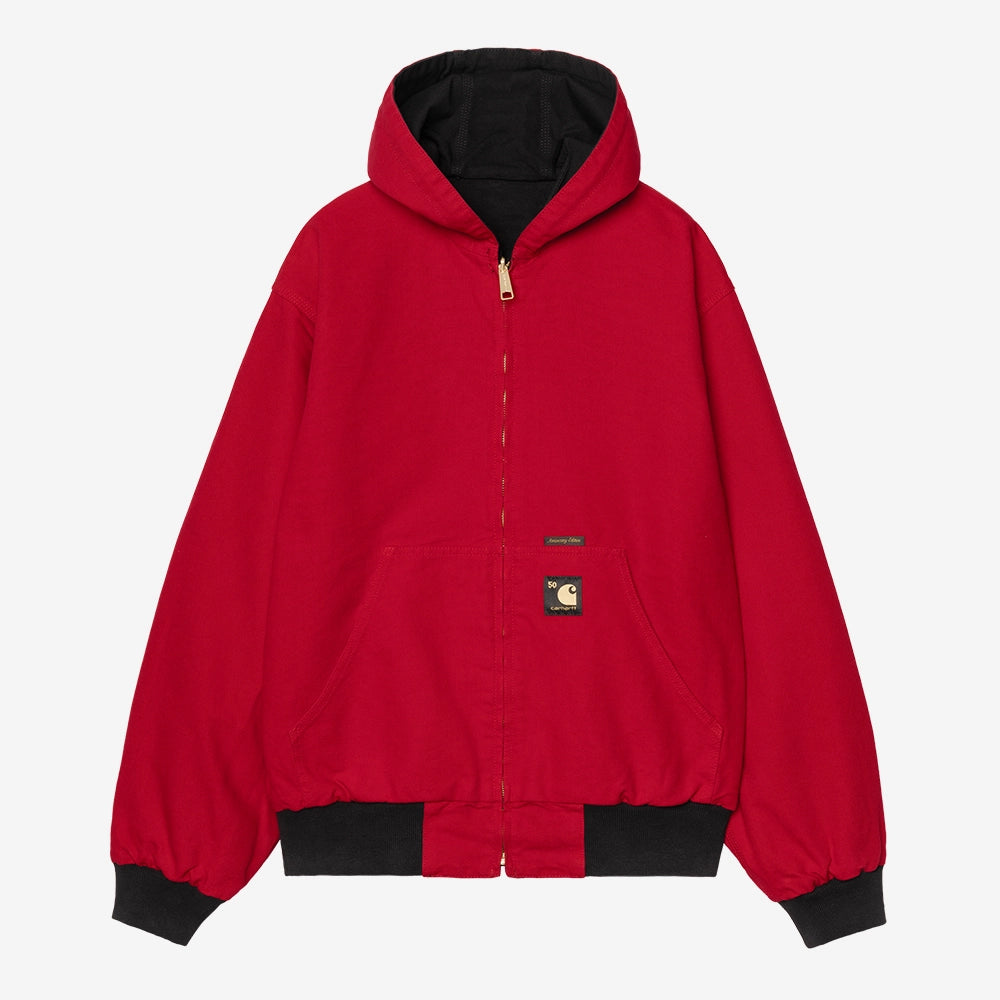 Carhartt WIP OG Active Jacket 50 Years Anniversary in Schwarz, aus Canvas, mit USA Red Innenfutter und Kapuze, rinsed.