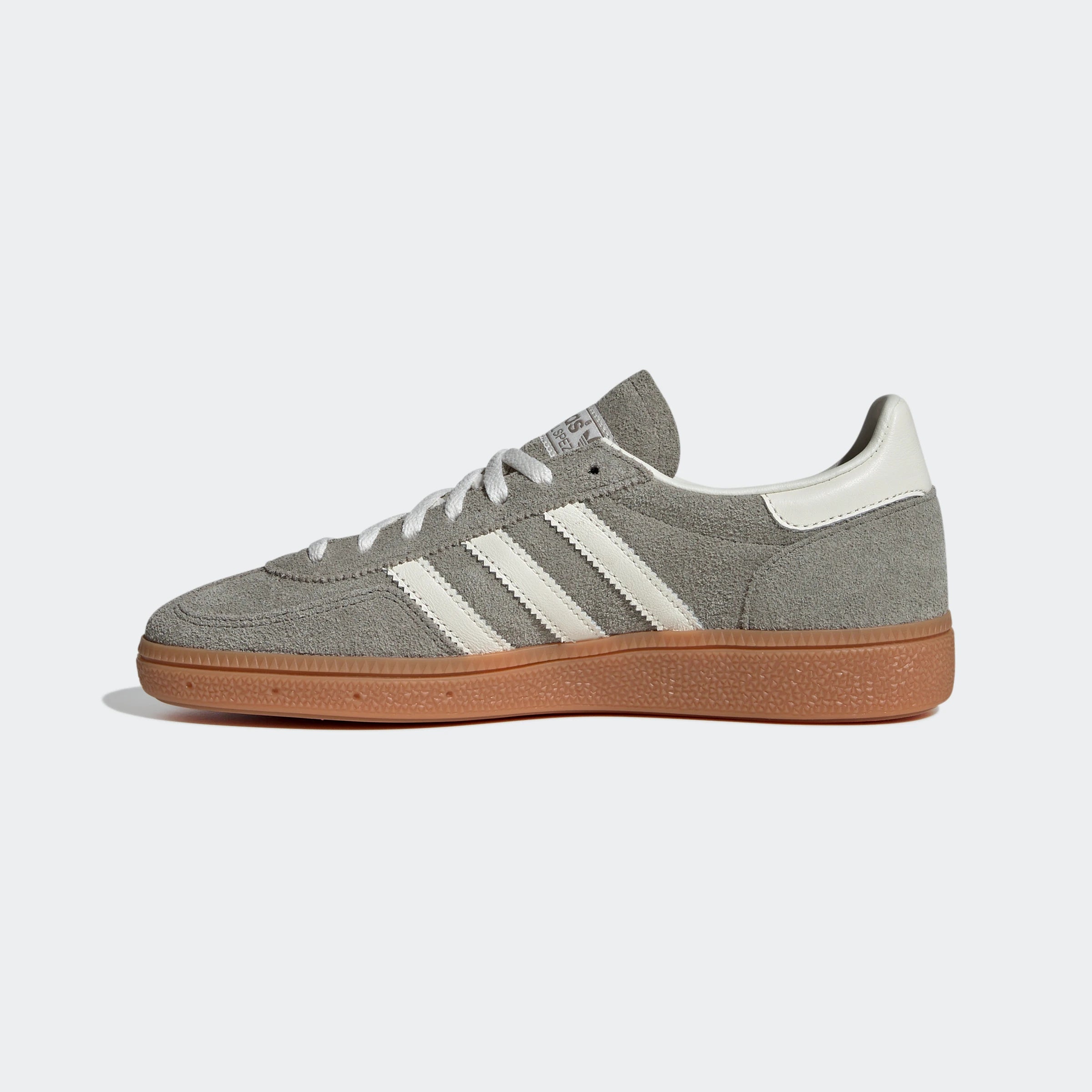 "Adidas Handball Spezial Grau/Weiß IG1966: Legendärer Retro-Sneaker mit Wildleder-Upper, Gummisohle und 3-Streifen Look."