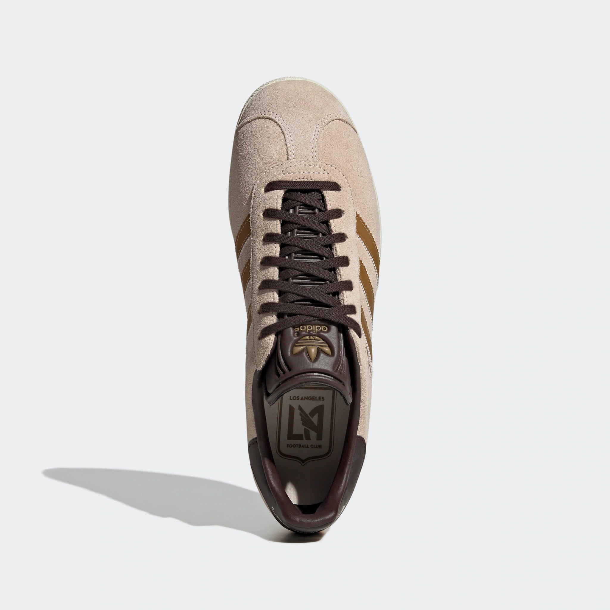 “Adidas Gazelle Retro-Sneaker in Braun/Gold IH0203: Schuhe mit „Gazelle“-Branding und MLS Team Edition von LAFC.“