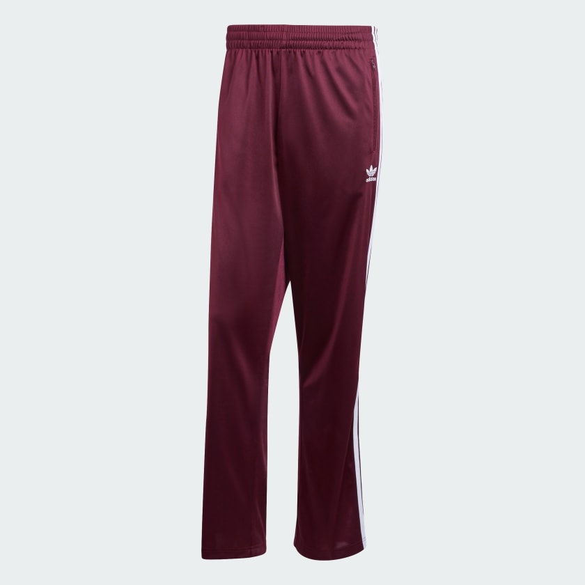 "Adidas Classics Firebird Track Pants in Maroon/Weiß, IN4678, adidas Trainingshose aus Polyester-Mischung, klassische Trainingshose mit Streifen, Reißverschlusstaschen."