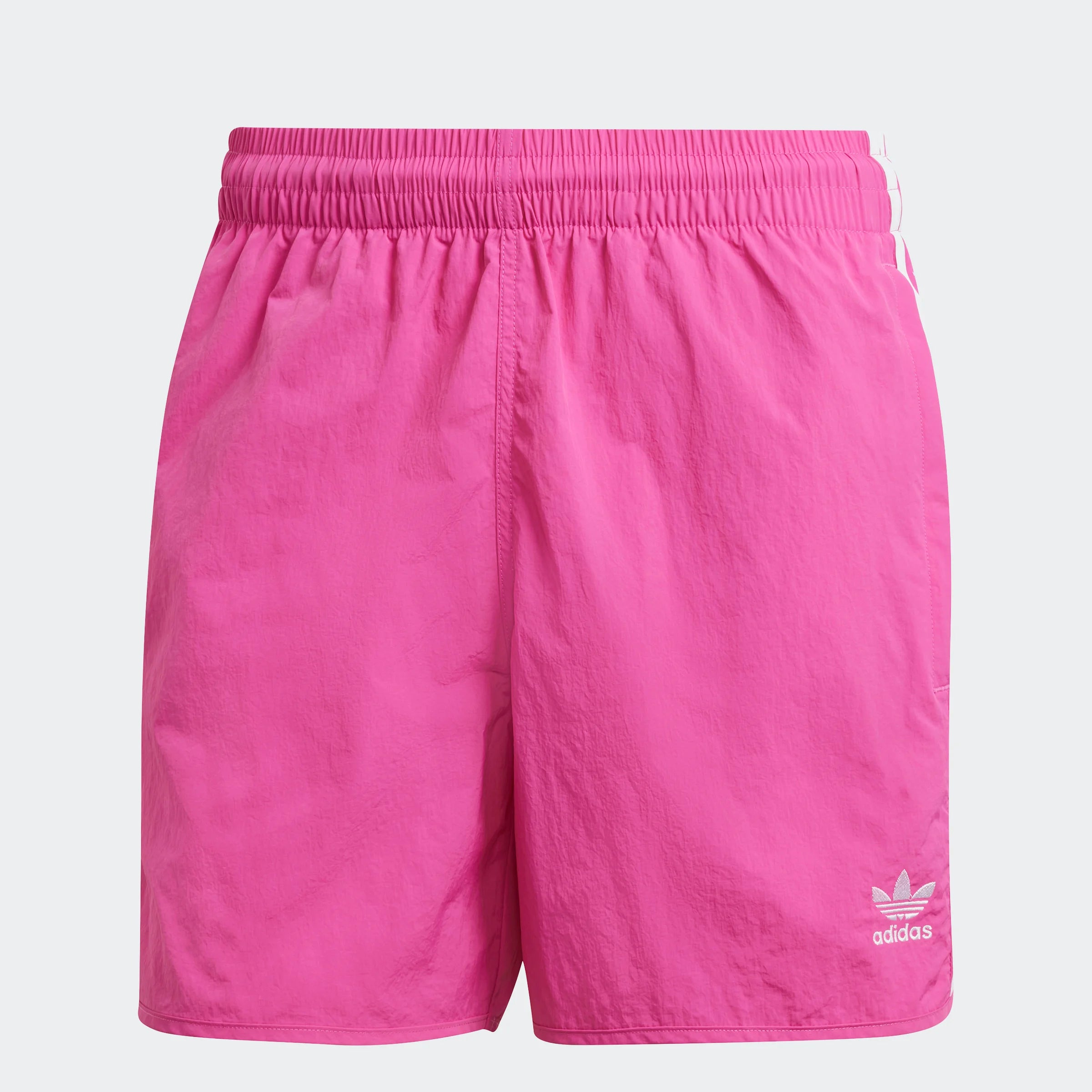 "Leuchtend pinke Adidas Sprinter Shorts. Kurze, sportliche Hose mit elastischem Bund und kleinem, farblich passendem Adidas Logo am Bein."