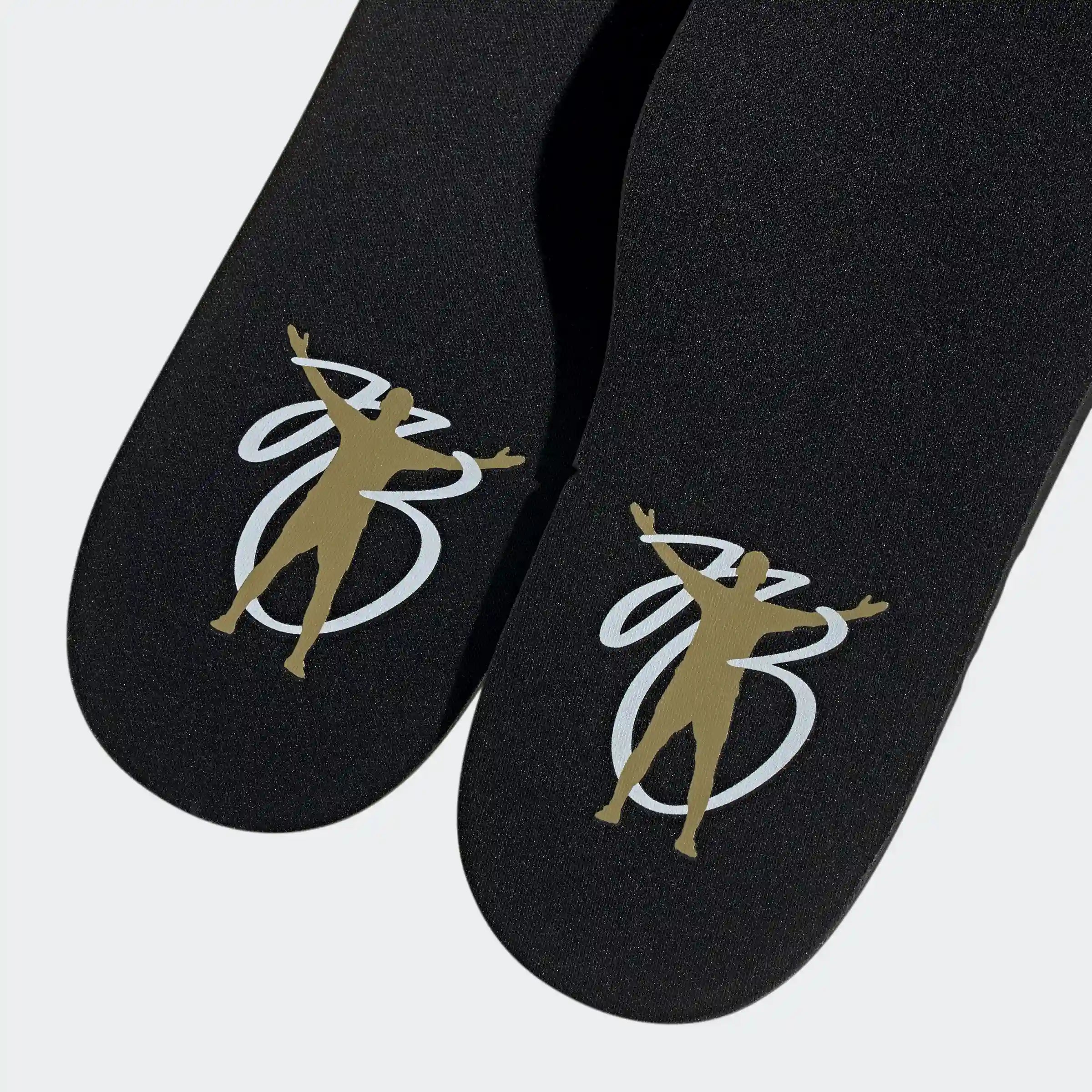 “Adidas Gazelle Retro-Sneaker in Schwarz/Gold JH5703: JB Schuhe mit „Gazelle“-Branding an der Seite und Suede Upper.“