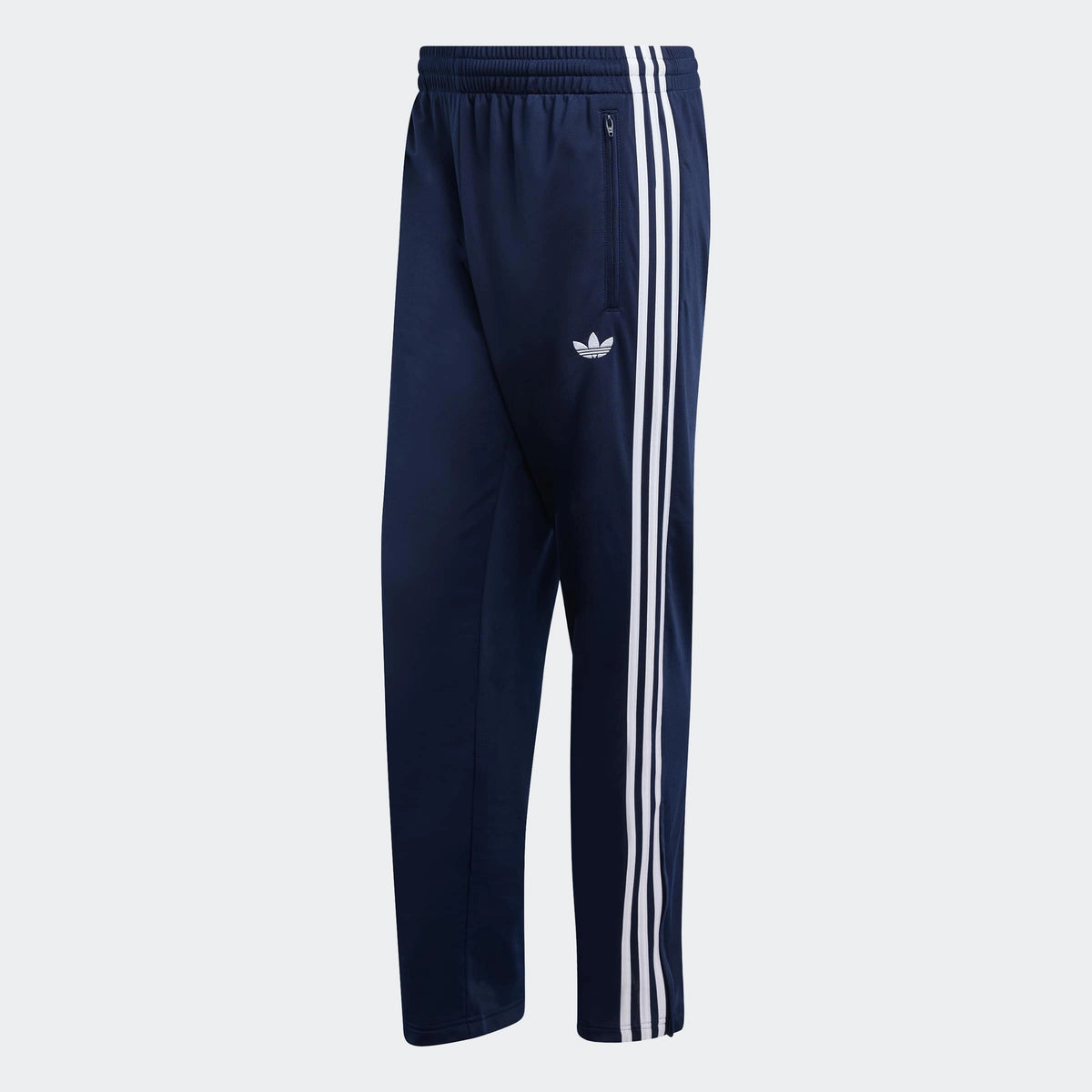 adidas Originals Firebird Track Pants in Night Indigo – Vorderansicht der dunkelblauen Trainingshose im Retro-Look mit den ikonischen 3-Stripes.