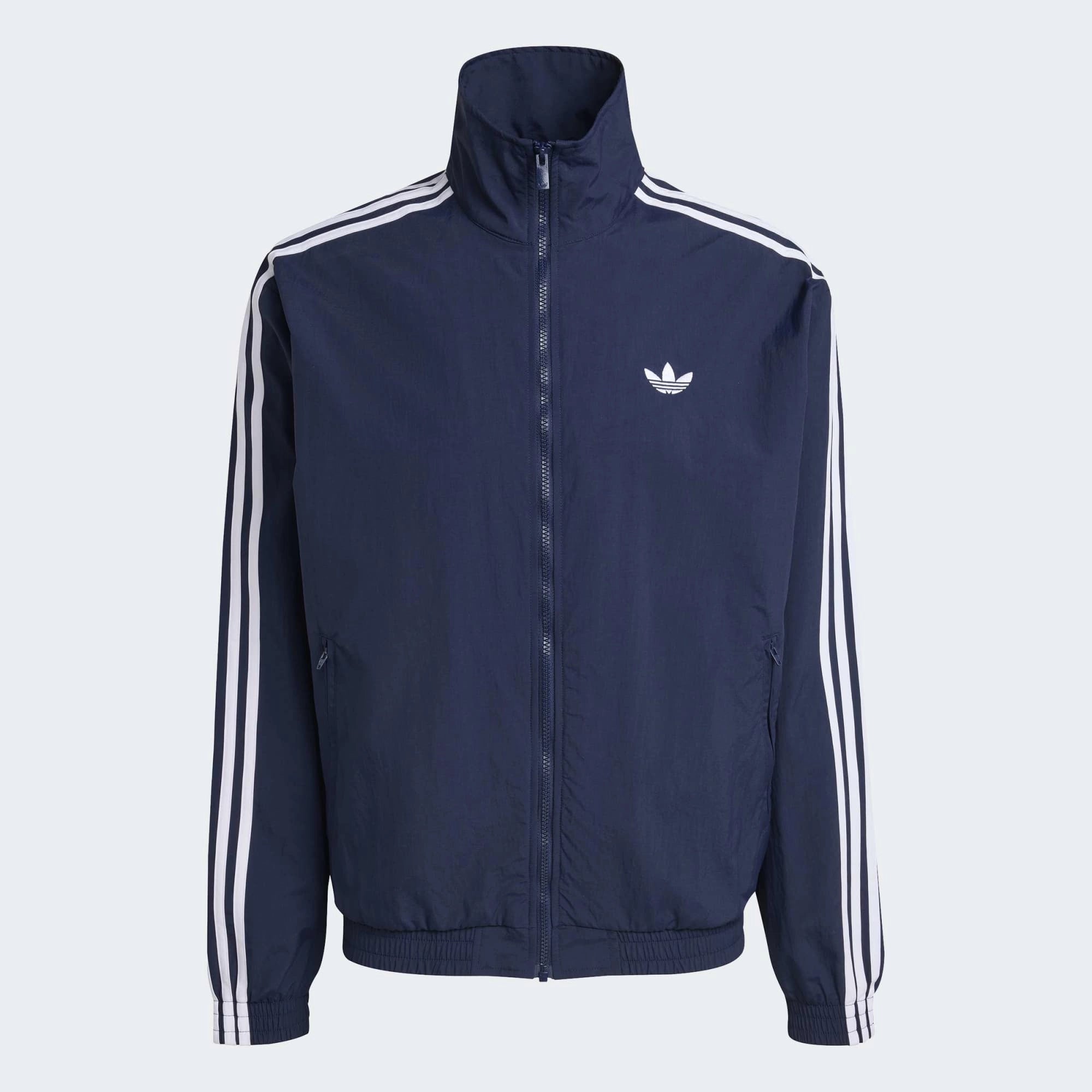 “adidas Originals Firebird Woven Trainingsjacke Herren in Dunkelblau Night Indigo, gewebtes Material, weiße 3-Streifen bei Stickabush.“