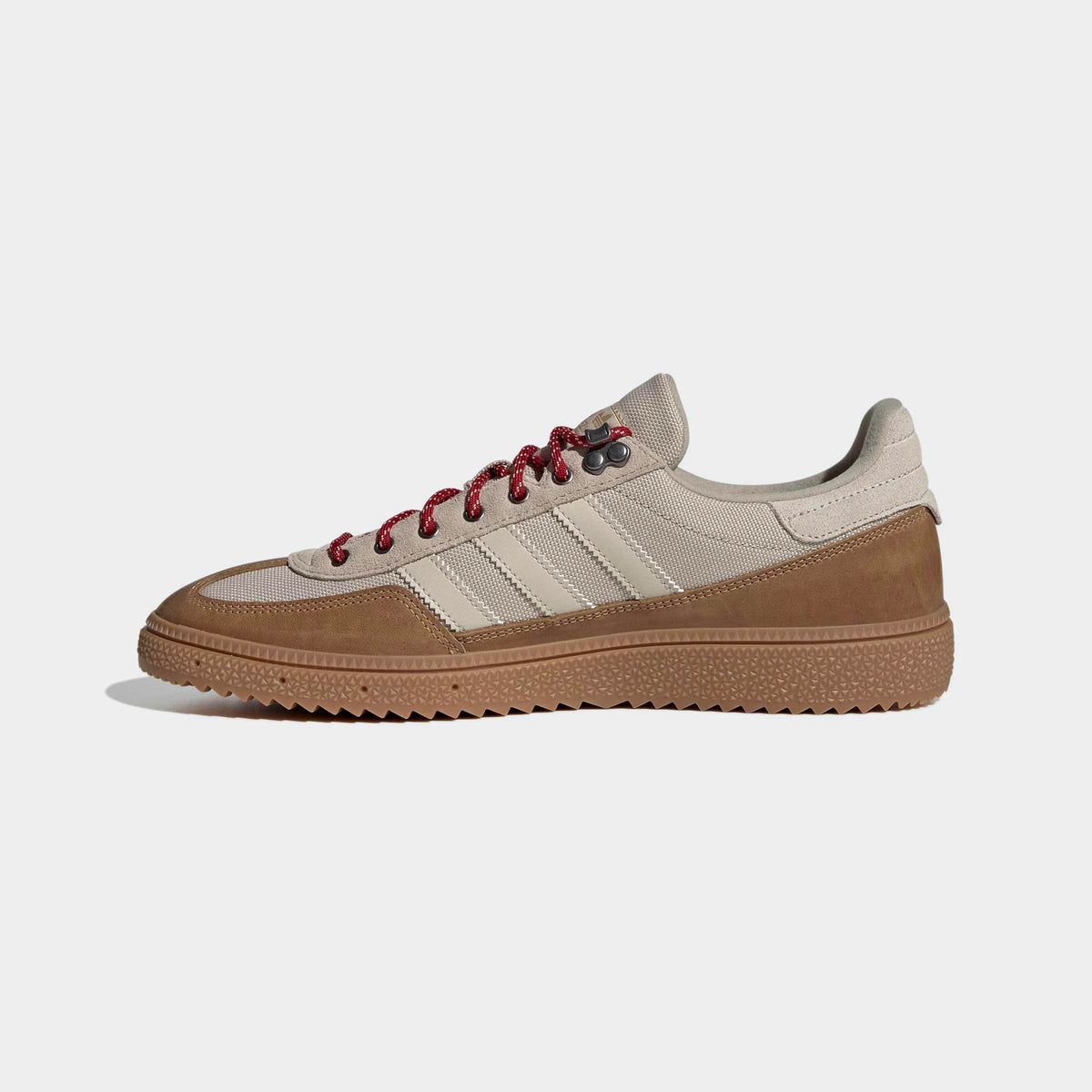 adidas Originals Handball Spezial WTR in Khaki Three / Bliss / Light Cinnamon – Innenansicht des khakifarbenen Retro-Sneakers mit Metallösen und charakteristischen 3-Stripes.
