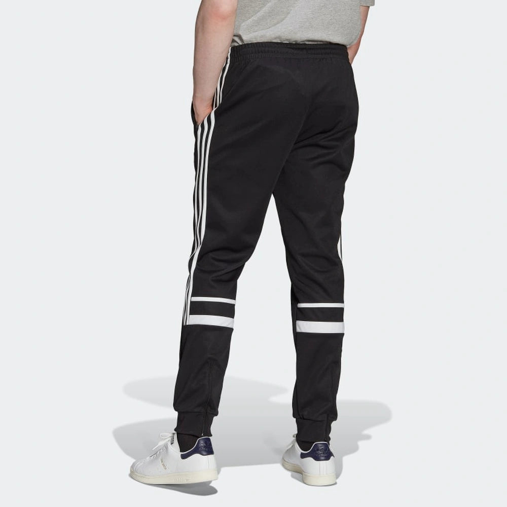 "Adidas Classics Cutline Pants, Black/White (schwarz/weiß), weiches Material (vermutlich Baumwollmischung), lässige Hose mit seitlichen Einsätzen und dezentem Logo."