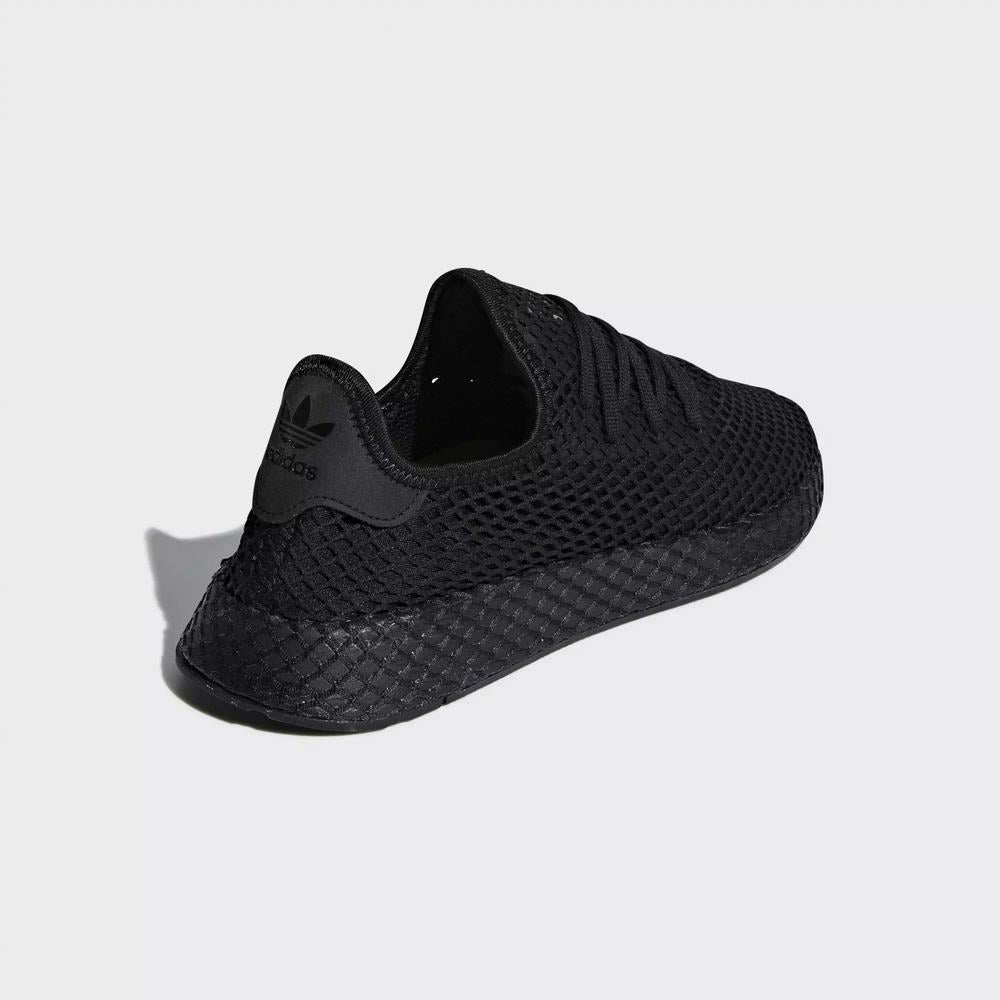 "Adidas Deerupt Runner J, Core Black/Ftwr White, Textil, auffälliger Sneaker in Schwarz-Weiß mit netzartiger Gitterstruktur."