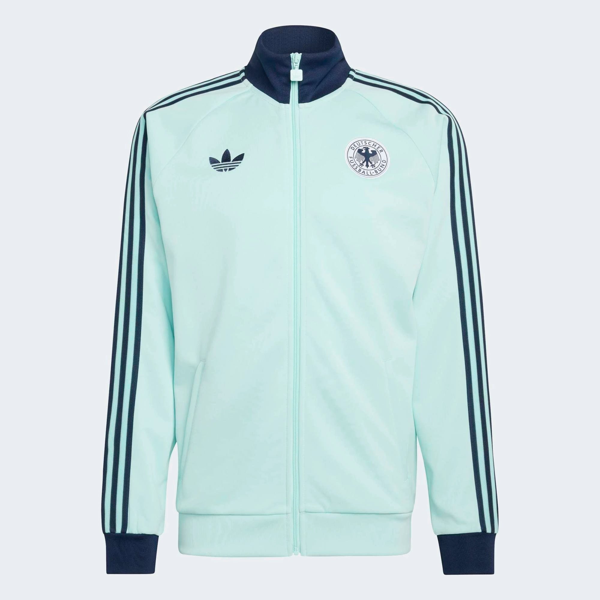 “Die türkise adidas Originals Deutschland OG Trainingsjacke (Semi Flash Aqua) mit klassischen weißen 3-Streifen und Retro-Details bei Stickabush“.