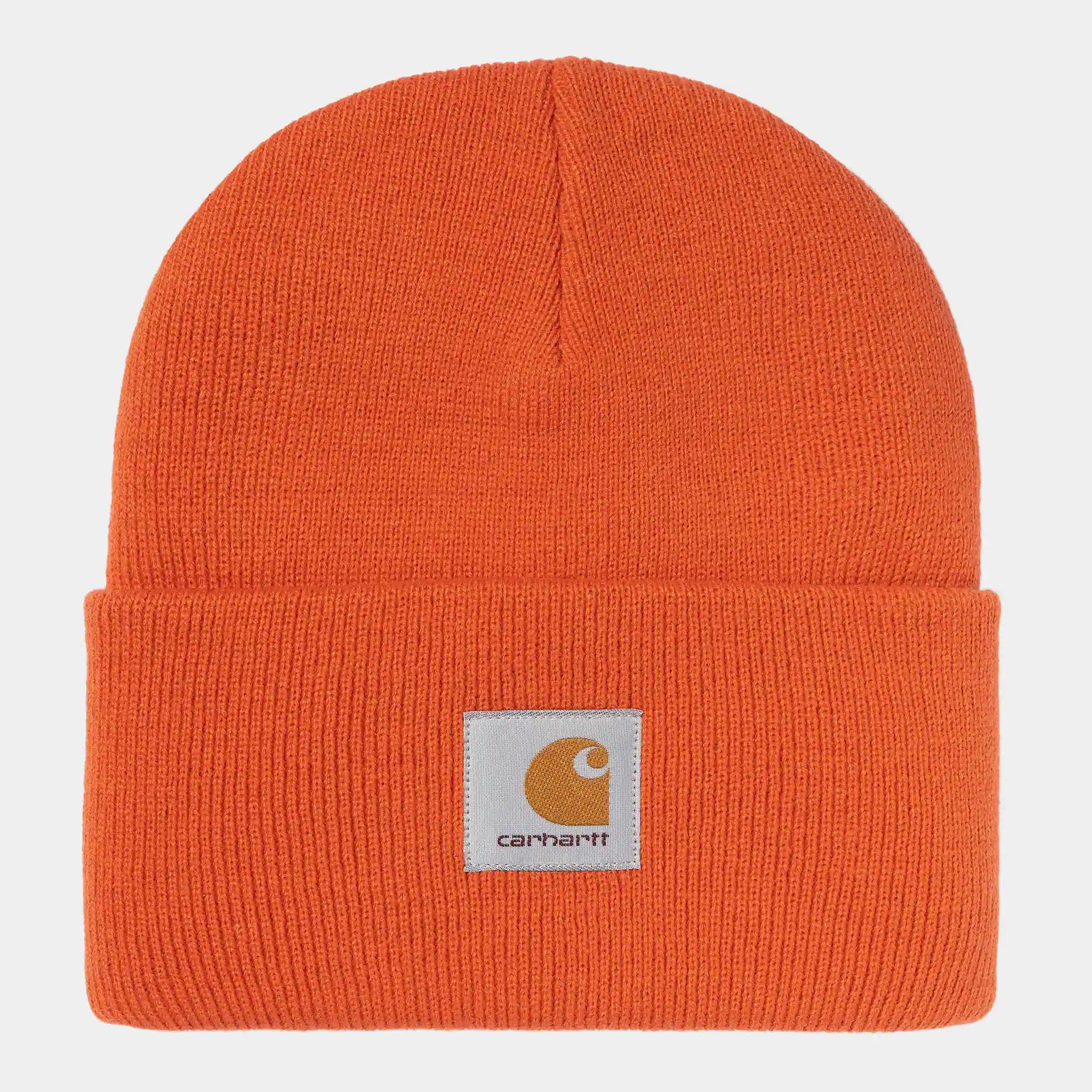 “Orangefarbene Carhartt WIP Acrylic Watch Hat. Gerippte Strickmütze aus Acryl, umschlagbarer Bund mit gewebtem Carhartt Square Label.“