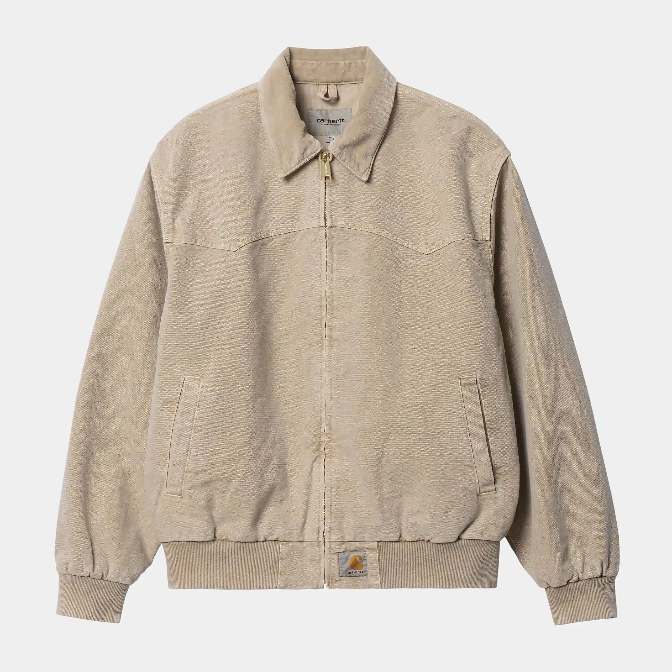 “Verblasste braune ("Dusty Hamilton Brown faded") Carhartt WIP OG Santa Fe Jacke. Robuste Jacke aus Baumwoll-Canvas mit Cordkragen, Steppfutter, Reißverschluss und gewebtem Square Label.“