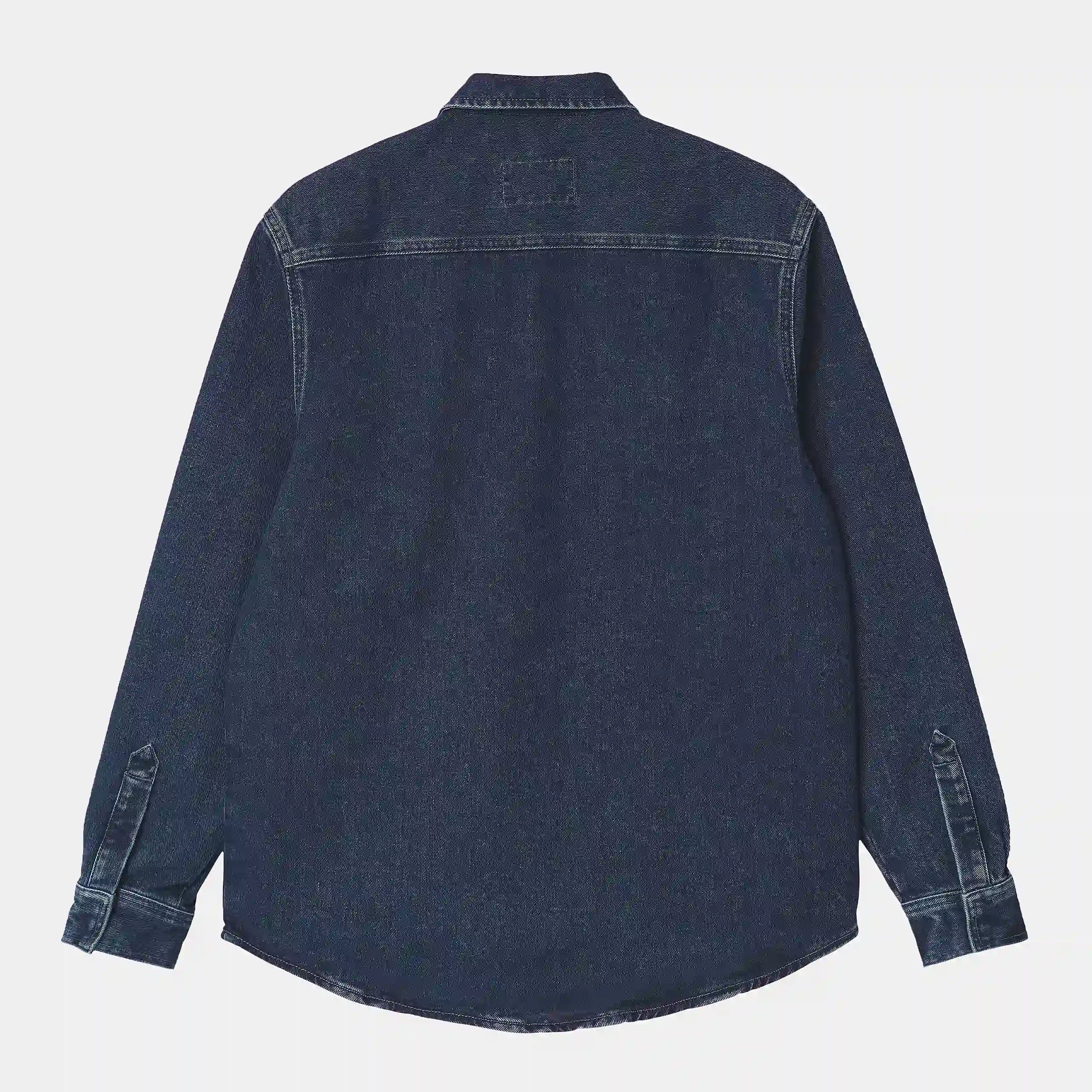 “Helles Denimblaues Carhartt WIP Salinac Shirt Jacket. Leichte Hemdjacke aus Baumwoll-Denim, mit Druckknopfverschluss, zwei Brusttaschen und gewebtem Carhartt Square Label.“