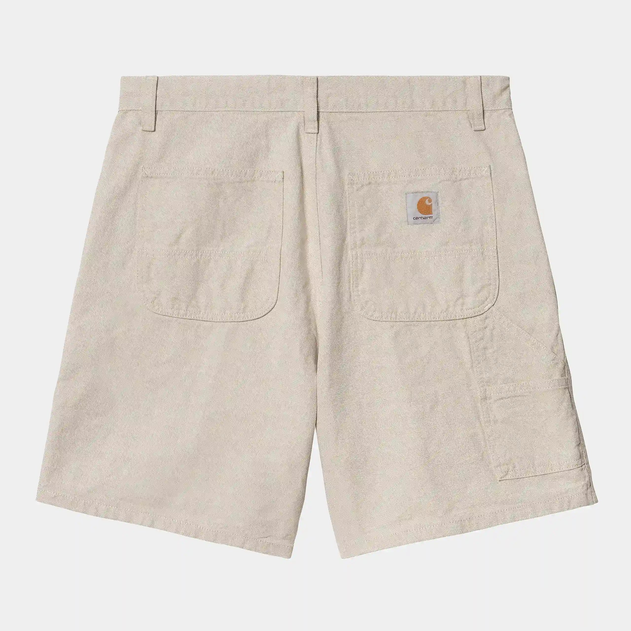 "Cremefarbene ("Natural rinsed") Carhartt WIP Walter Single Knee Short. Robuste Shorts aus Baumwoll-Twill, mit Hammerschlaufe, Werkzeugtaschen und gewebtem Carhartt WIP Square."