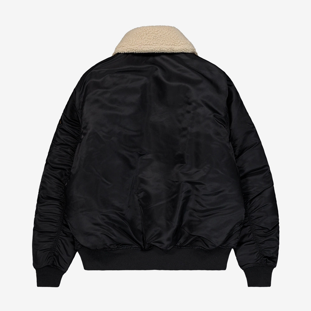 "Schwarze, wendbare Bomberjacke aus Nylon mit abnehmbarem Fellkragen, Utility Pocket und Rippbündchen.“