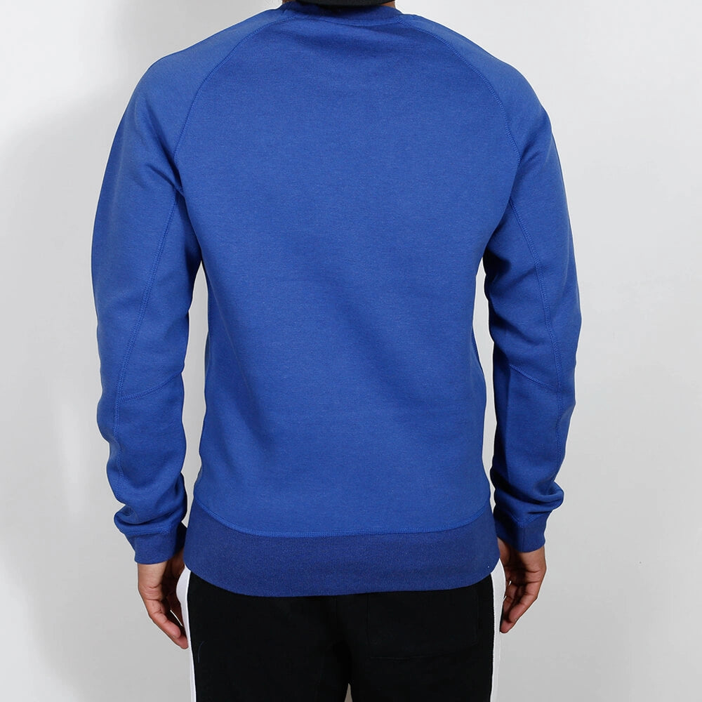 „Blau meliertes Nike Sportswear Tech Fleece Sweatshirt für Herren mit Rundhalsausschnitt und schwarzem Logo-Print in Deep Royal Heather bei Stickabush Berlin.“