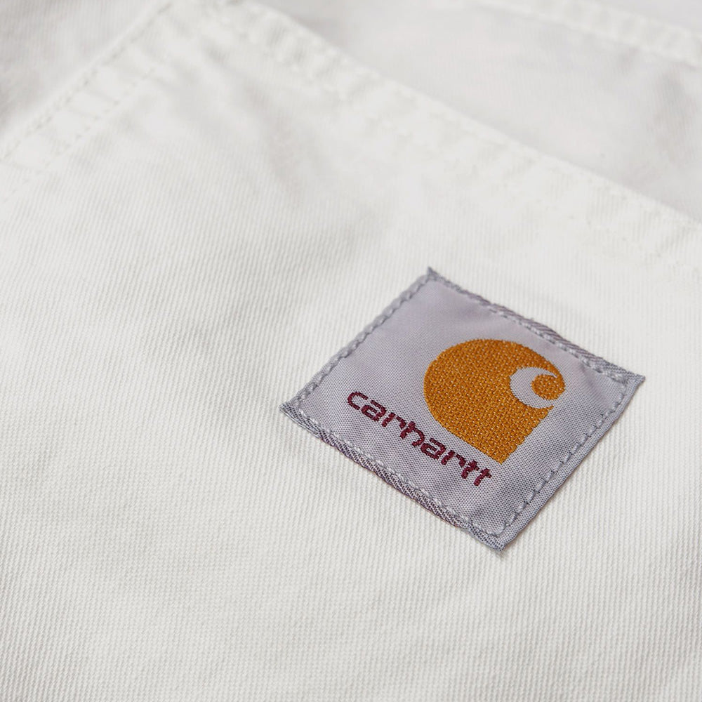 Carhartt WIP Toledo Pant – Off-White. Weiße Hose aus Leinen-Baumwoll-Mischung, mit weitem Bein, elastischem Kordelzug am Bund und Carhartt WIP Logo.