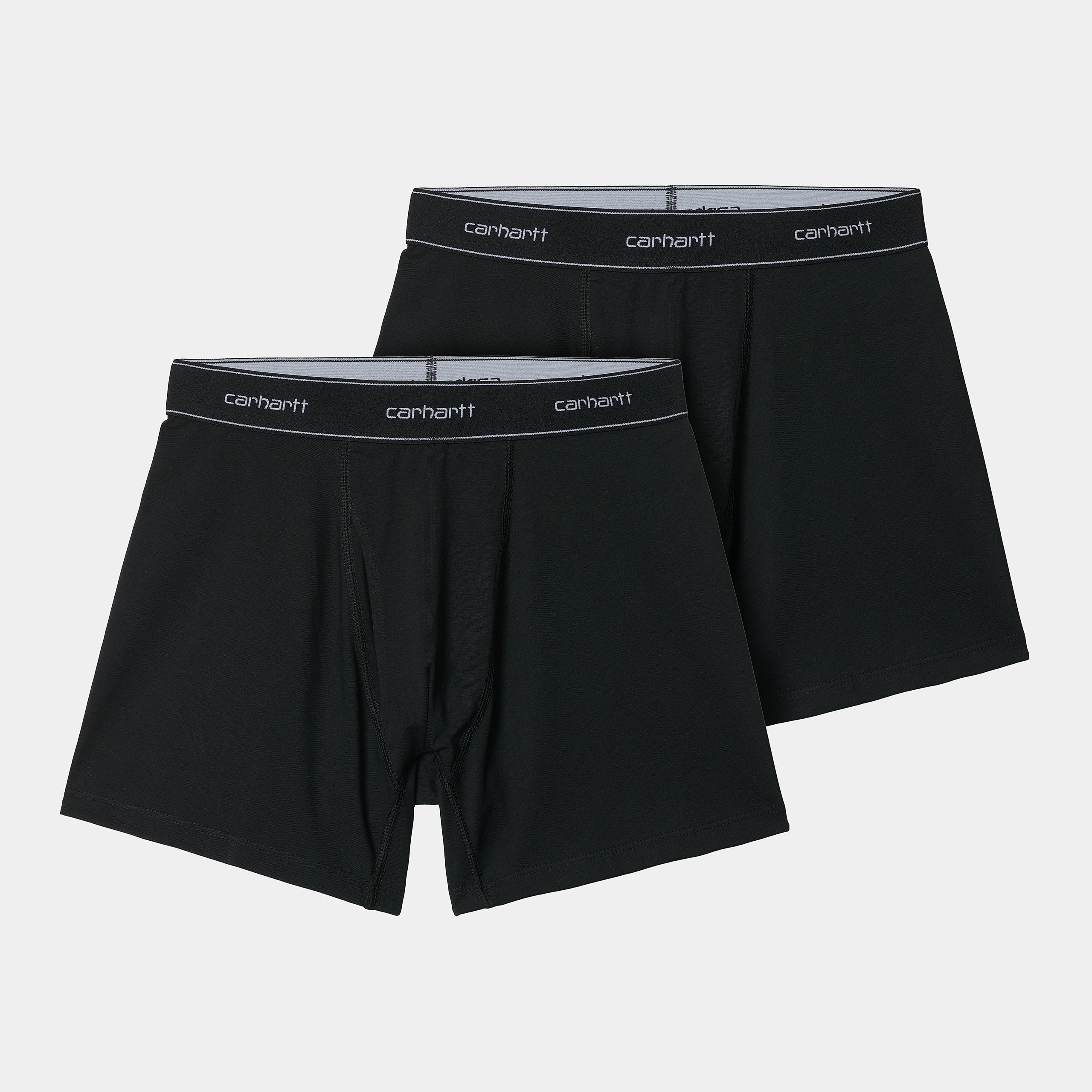 “Zwei schwarze Carhartt WIP Cotton Trunks in Black, aus Baumwolle, mit elastischem Bund und Carhartt WIP Logo bei Stickabush Berlin.“