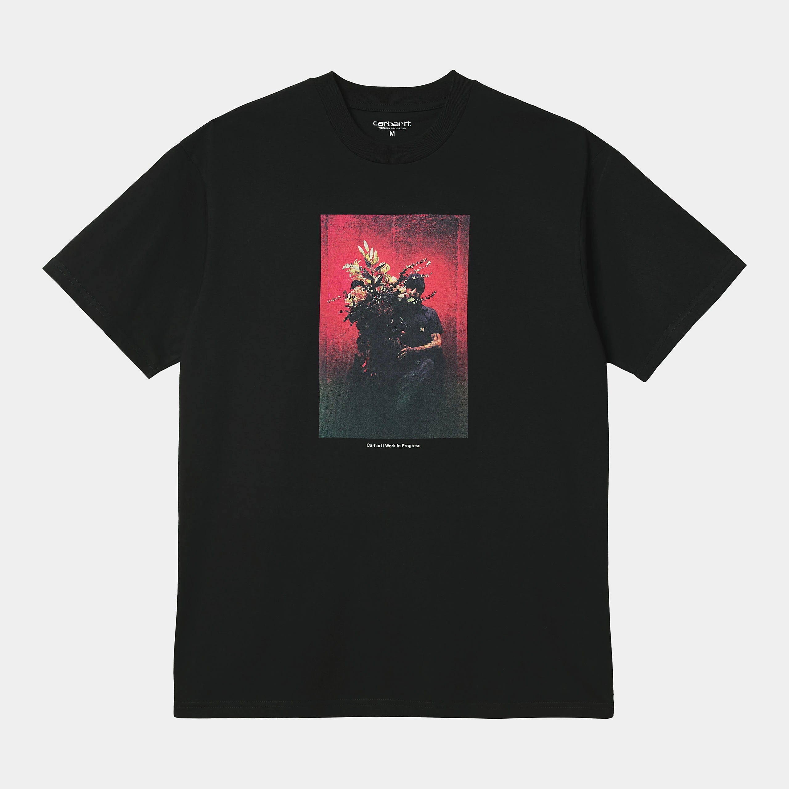 Carhartt WIP Bouquet T-Shirt in Schwarz. Lockeres Shirt aus Baumwoll-Jersey, mit großem, farbigem Bouquet-Grafikprint auf dem Rücken.
