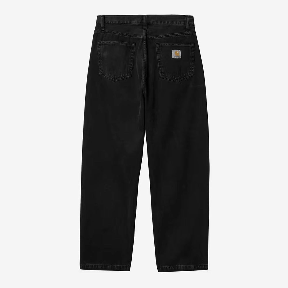 Carhartt WIP Landon Pant in Black (stone washed) – Locker geschnittene Herren-Jeans mit Tapered Leg und Square Label in der Hinteransicht bei Stickabush.