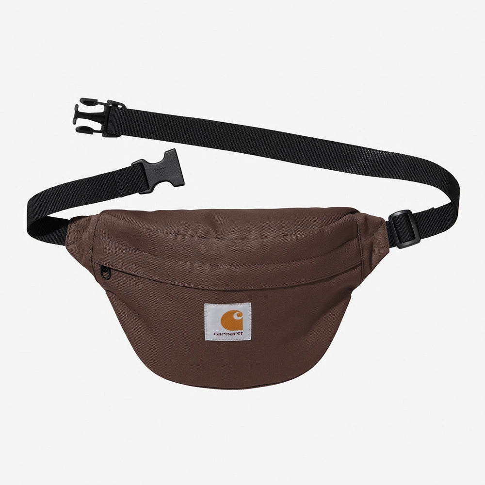 Carhartt WIP Jake Hip Bag – Palisander. Braune Bauchtasche aus wasserabweisendem Canvas-Stoff, mit Reißverschluss, verstellbarem Riemen und Carhartt WIP Logo.
