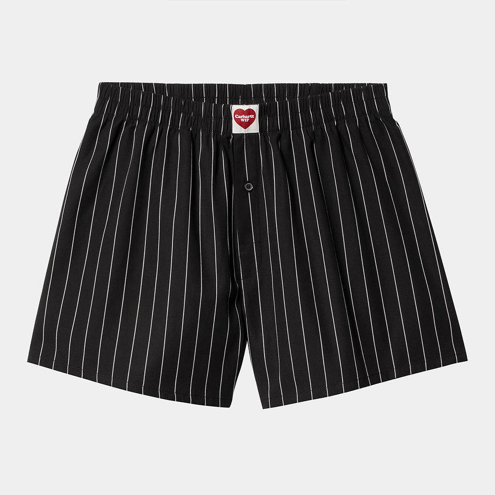 Die Carhartt WIP Cotton Boxer ist aus Baumwolle gefertigt, mit elastischen Bund und einem kleinen roten Herz. Stil und Komfort für Liebhaber von Herren-Unterwäsche.
