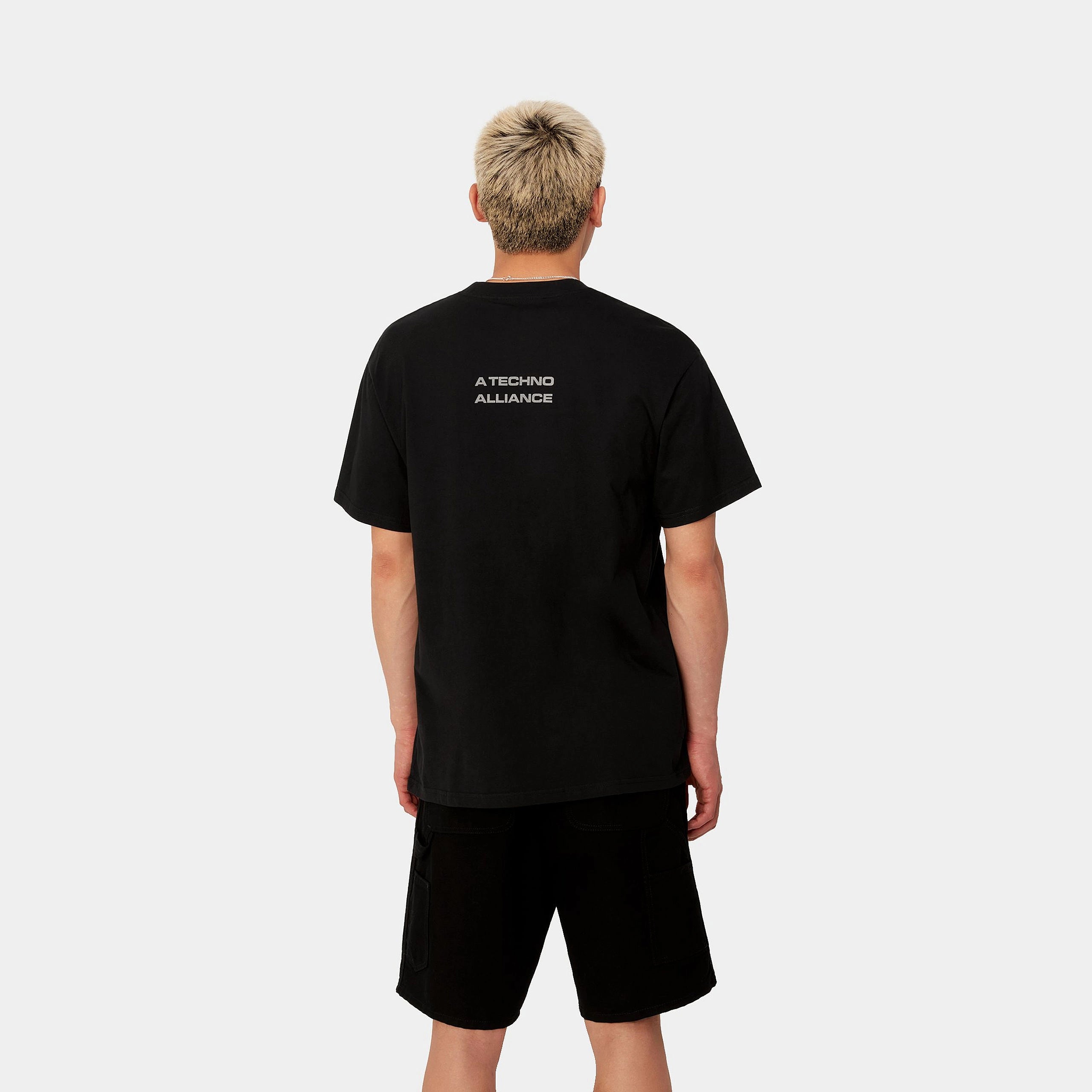 "Carhartt WIP x TRESOR Techno Alliance S/S T-Shirt, Schwarz/Dunkelgrau reflektierend, Baumwolle, Kurzarmshirt mit reflektierendem Print und Co-Branding."