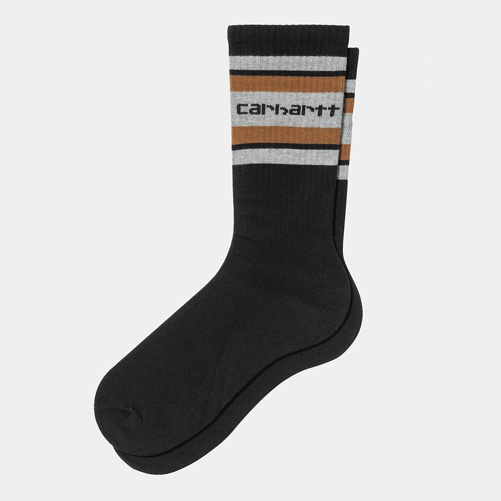 Carhartt WIP Connors Socks – Black. Schwarze, gerippte Socken aus Baumwoll-Mix mit weichem Frottee-Einsatz und einem gestickten Carhartt WIP Logo.