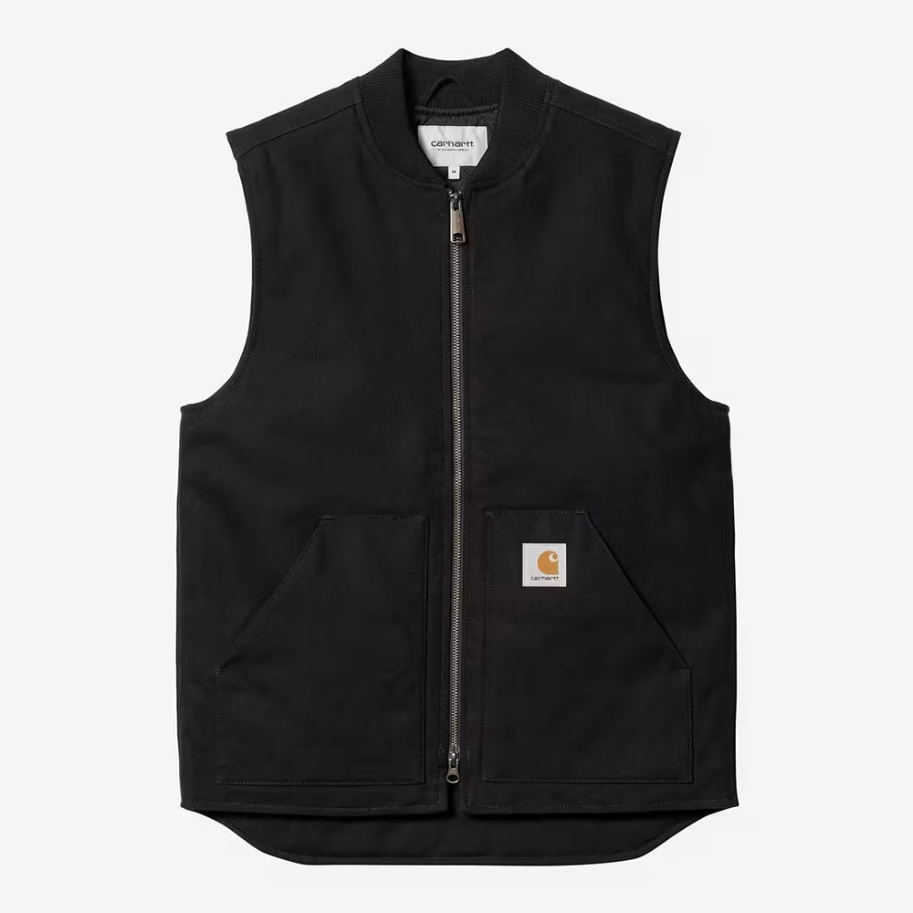 “Carhartt WIP Classic Vest in Black (Rigid) Dearborn Canvas mit Kängurutaschen und Marken-Patch jetzt bei STICKABUSH.“