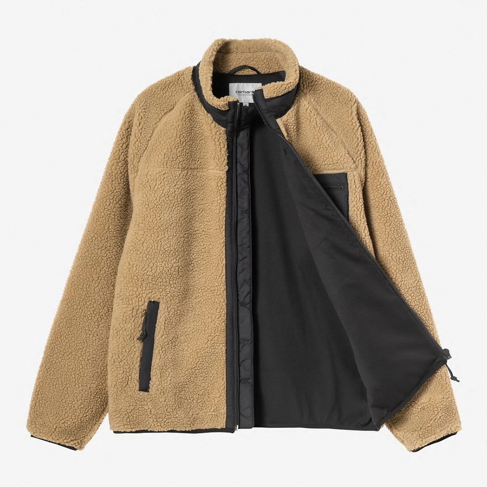 "Carhartt WIP Prentis Liner in Lederbraun und Schwarz. Kuschelige Fleece-Jacke mit Nylon-Kontrastdetails und Square Label Logo."