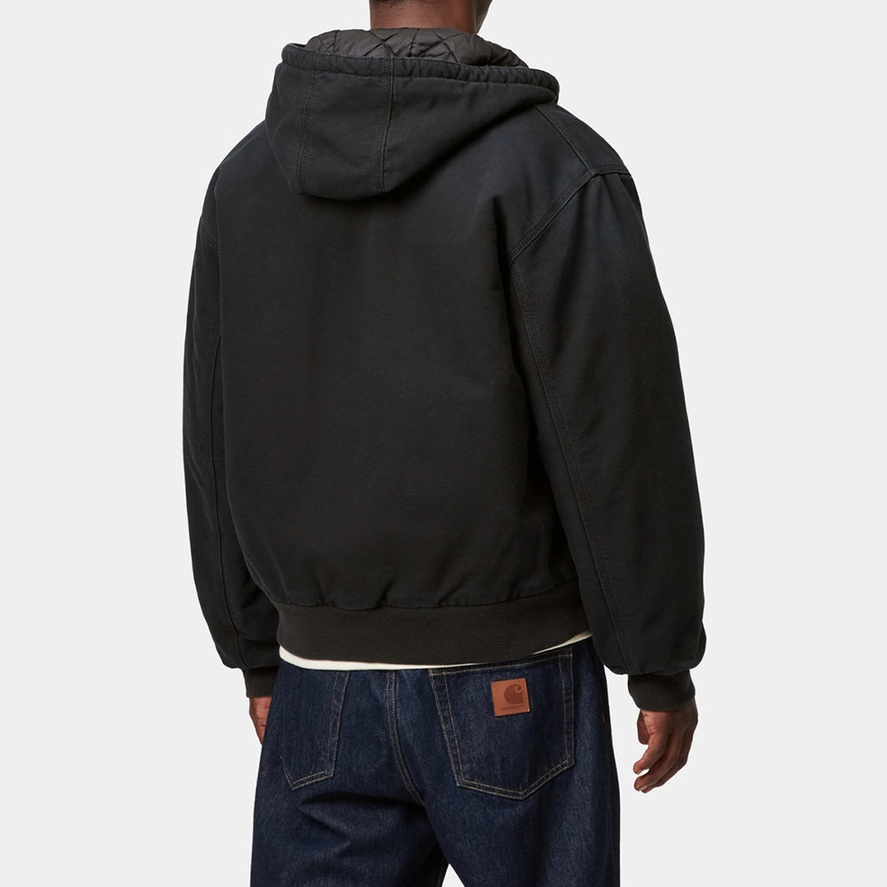 "Carhartt WIP OG Active Jacket in Schwarz, aus robustem Duck Canvas, mit Kapuze, Reißverschluss und Fronttaschen.“