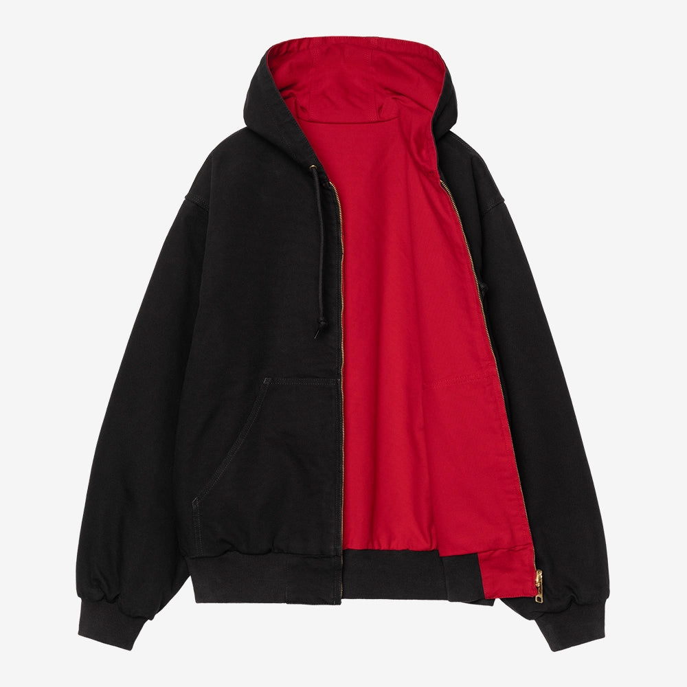 Carhartt WIP OG Active Jacket 50 Years Anniversary in Schwarz, aus Canvas, mit USA Red Innenfutter und Kapuze, rinsed.
