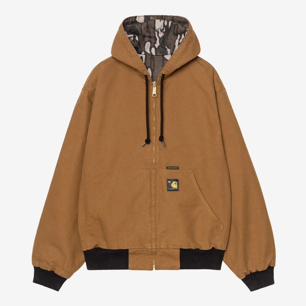Carhartt WIP OG Active Jacket 50 Years Anniversary in Hamilton Brown, Canvas-Material, mit Camo Treb Innenfutter und Kapuze, rinsed.