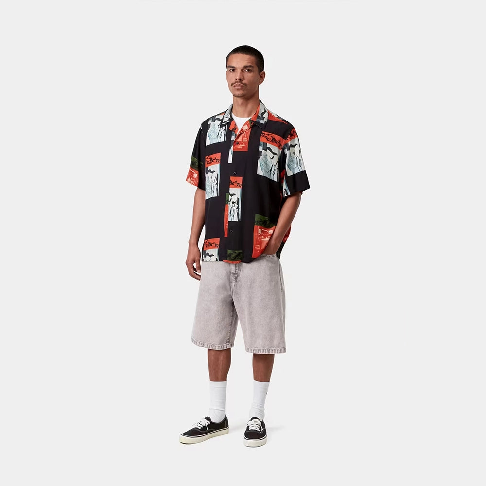 „Carhartt WIP Landon Short für Herren in Shale Chalk Wash – weit geschnittene Jeans-Shorts im Loose Fit aus grau-braun verwaschenem Denim mit quadratischem Logo-Label bei Stickabush Berlin.“