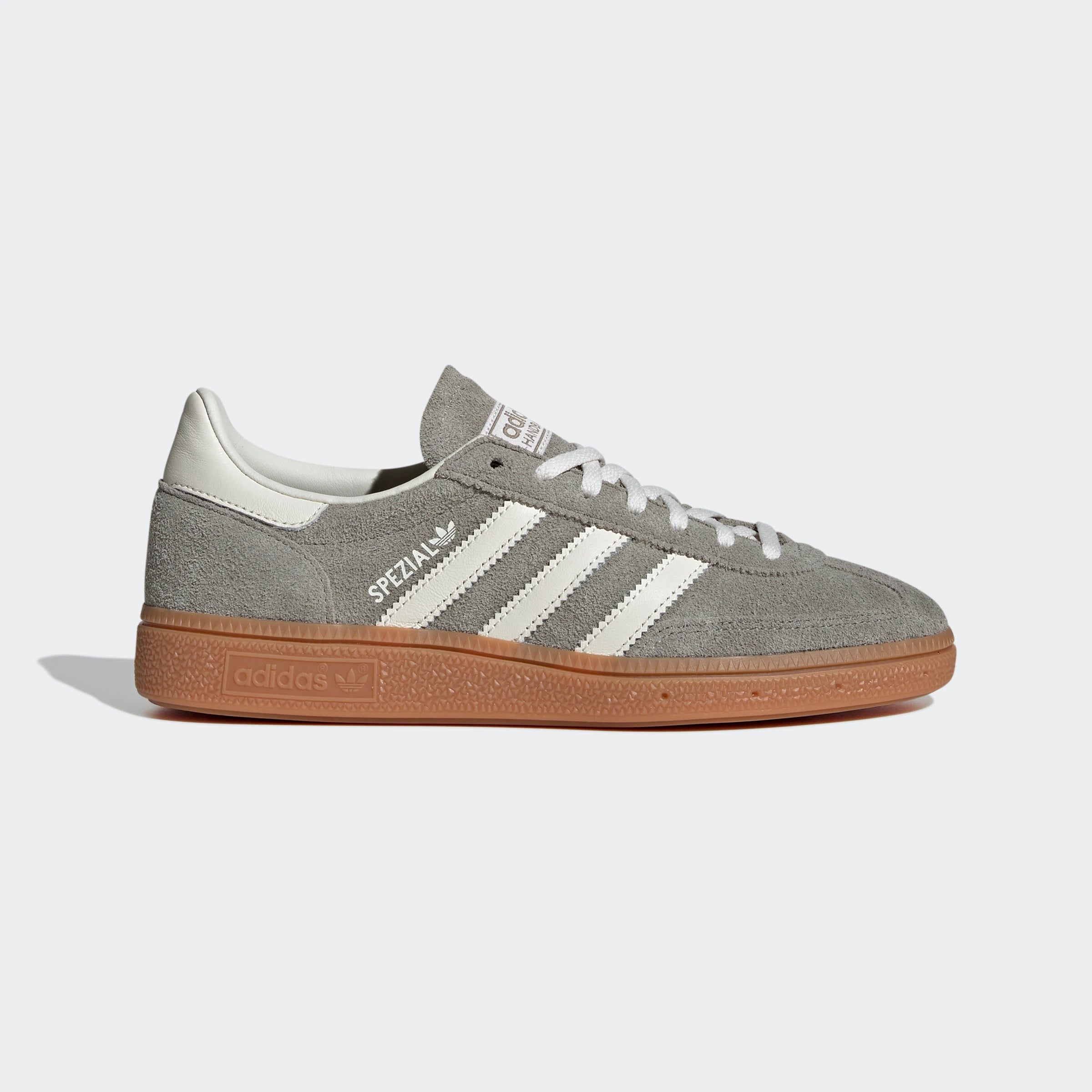"Adidas Handball Spezial Grau/Weiß IG1966: Legendärer Retro-Sneaker mit Wildleder-Upper, Gummisohle und 3-Streifen Look."