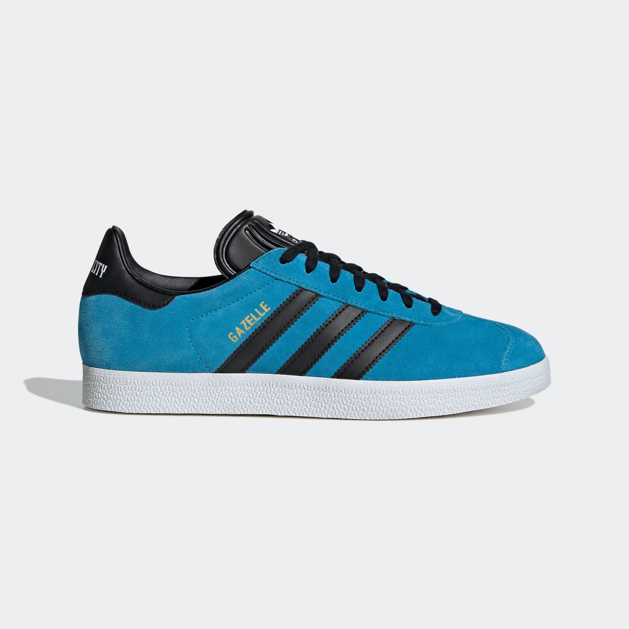 “Adidas Gazelle Retro-Sneaker in Blau/Schwarz IH2628: Schuhe mit „Gazelle“-Branding und MLS Team Edition von Kansas City.“