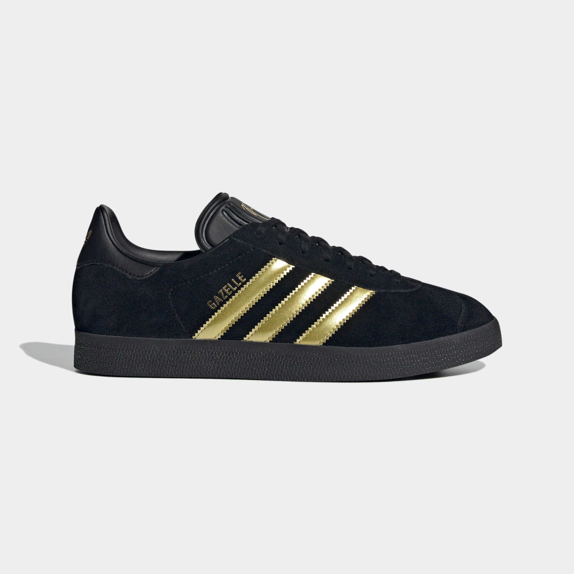 “Adidas Gazelle Retro-Sneaker in Schwarz/Gold JH5703: JB Schuhe mit „Gazelle“-Branding an der Seite und Suede Upper.“
